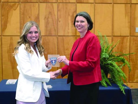 Kaci White earns Pharmacy Coat Patch