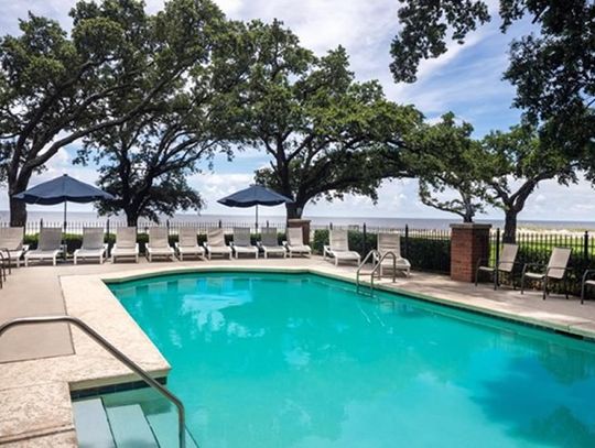 The Inn at Long Beach’s crown jewel – a beachfront pool surrounded by majestic Live Oaks, transported me back to the “old Coast “days.