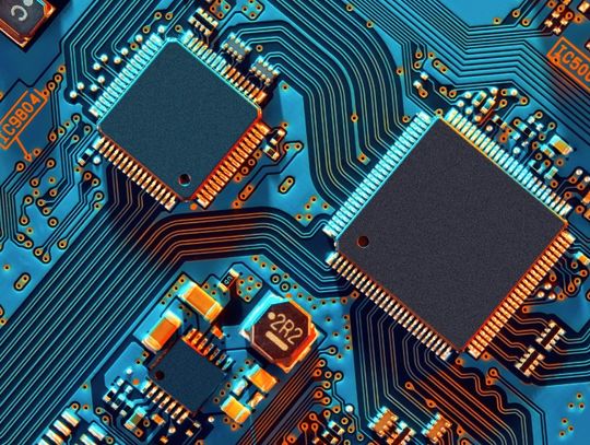 An electronic circuit board showing various components, such as resistors, capacitors, and integrated circuits.