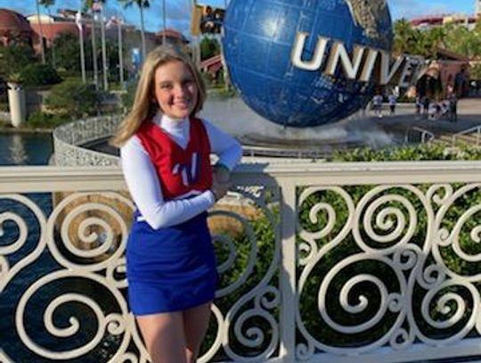 Two PHS cheerleaders perform in Orlando