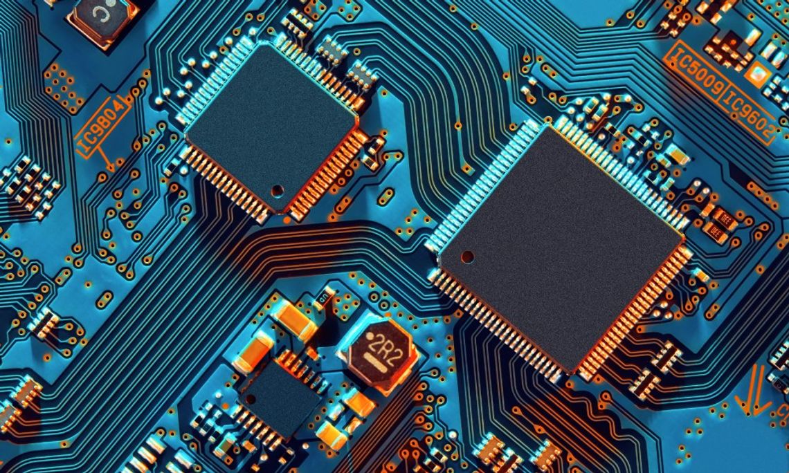 An electronic circuit board showing various components, such as resistors, capacitors, and integrated circuits.