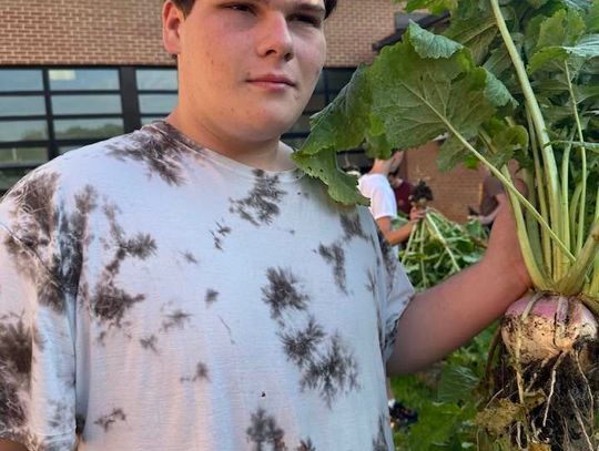 PHS students reap harvest of benefits from school garden