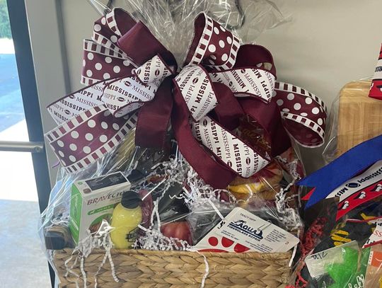Crooked Creek Animal Hospital holds raffle for local pup who serves the community- MSU Basket