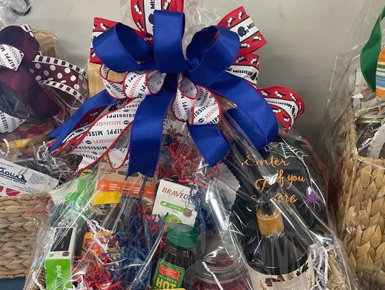 Crooked Creek Animal Hospital holds raffle for local pup who serves the community- Ole Miss Basket