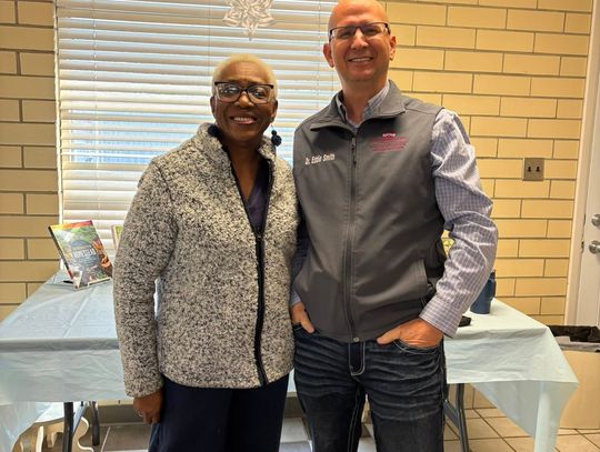 Petals' President Jearlean Holly and Dr. Smith